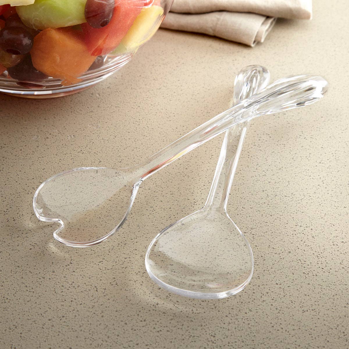 Arc Salad Tongs with sleek curved stainless steel handles and gripping prongs, displayed on white background
