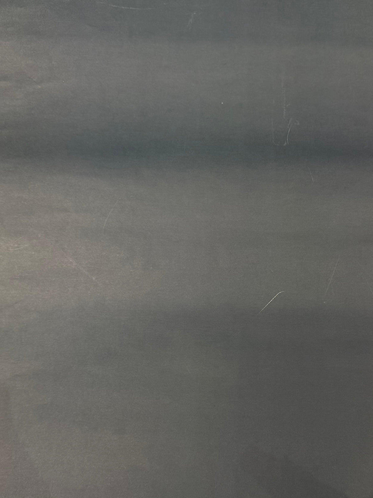 Solid lotus-blue gift wrap sheet with smooth matte finish texture