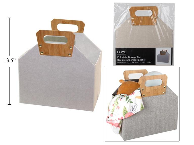 Foldable storage bin in white fabric with handles, ready for organizing home items