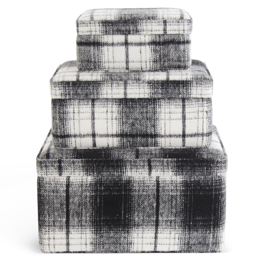 Black and cream nesting gift boxes stacked together with elegant ribbon detail