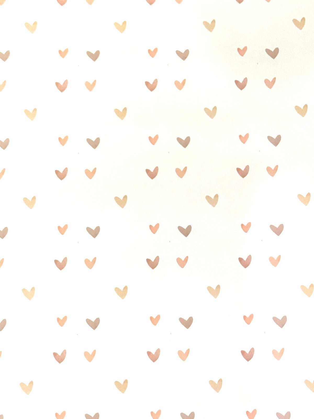 Red gift wrap sheet with repeating white heart pattern design