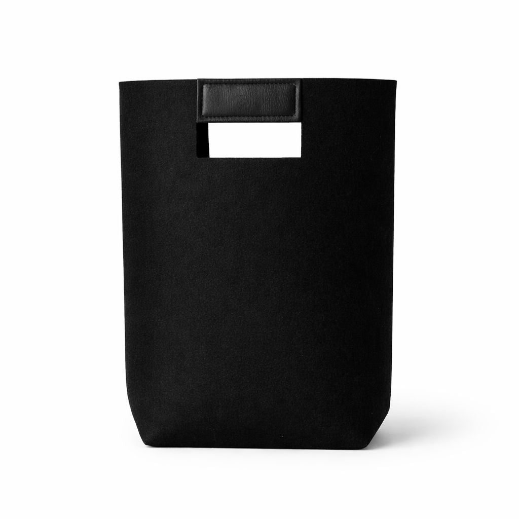 Burgundy felt gift bag with brown leather handles, perfect for holiday presents