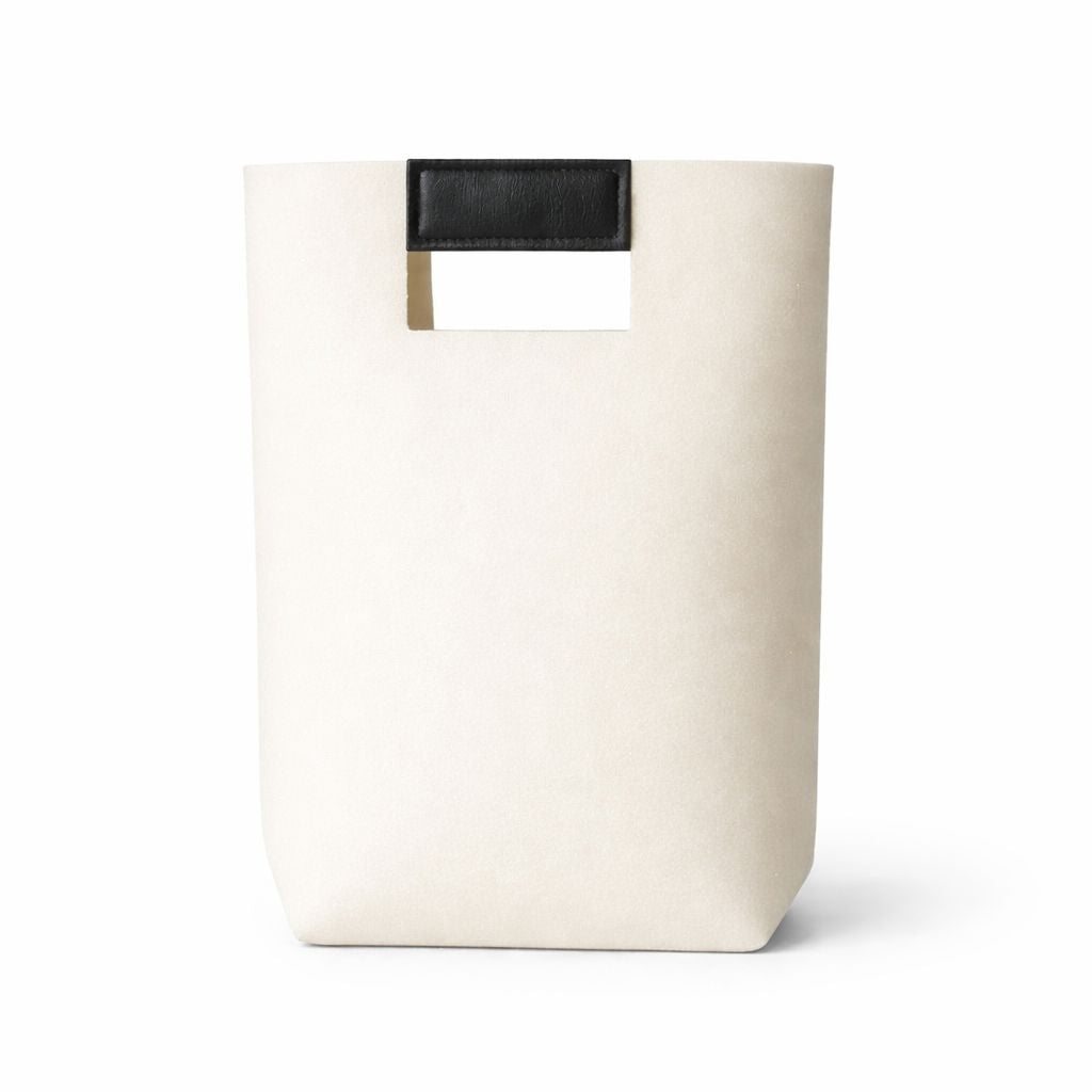 Beige felt gift bag with tan leather handle and rope detailing