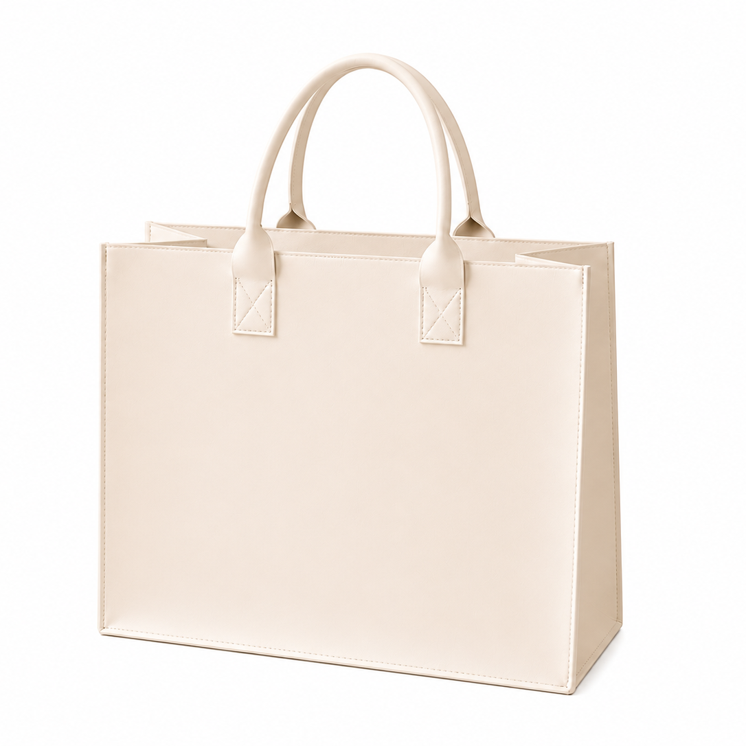 Brown leather shoulder bag with dual handles and structured silhouette