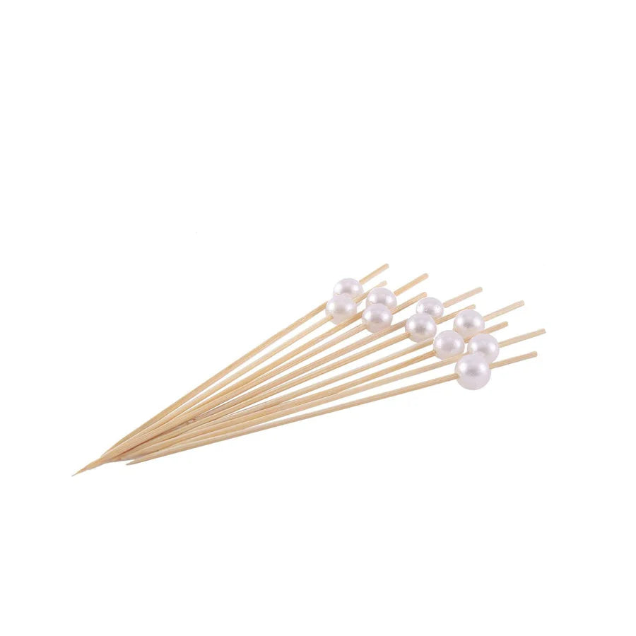 Colorful cocktail picks with decorative toothpick designs displayed together