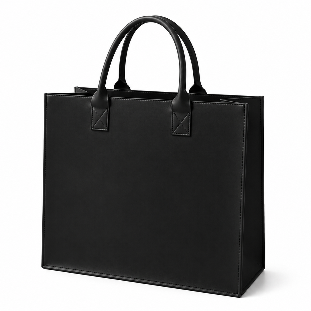 Brown leather bag with dual handles and structured design, front view