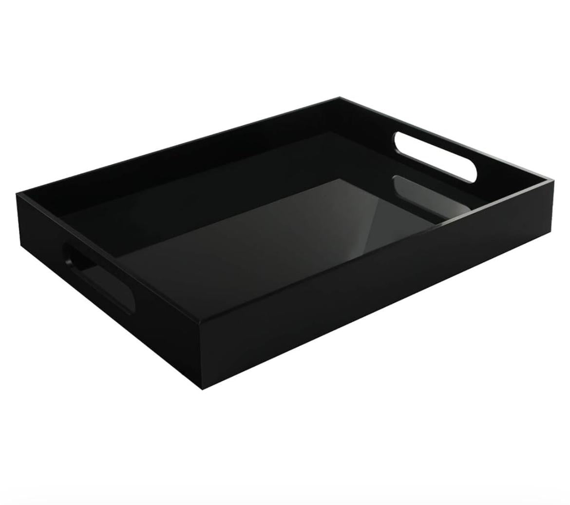 Black acrylic tray with sleek modern design and raised edges for serving