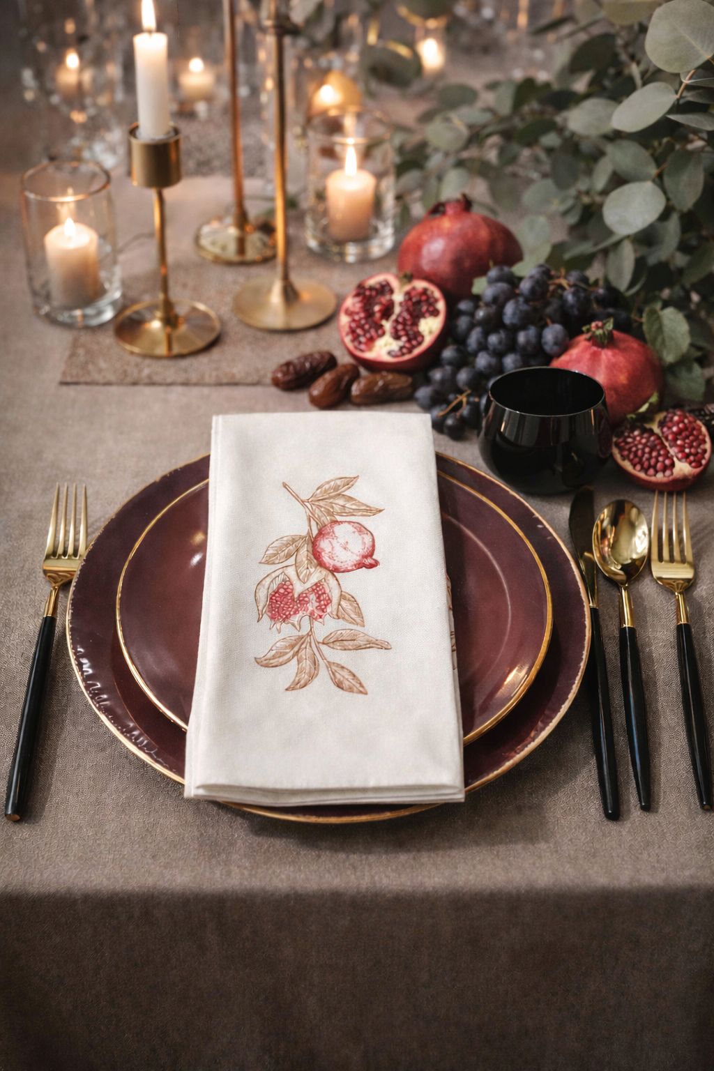 Pomegranate Grace Collection burgundy ceramic jar with gold accents and lid