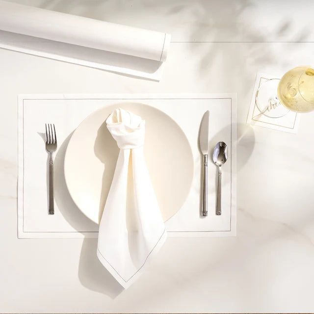 White linen look fabric with delicate rabbit pattern from the White Rabbit Collection