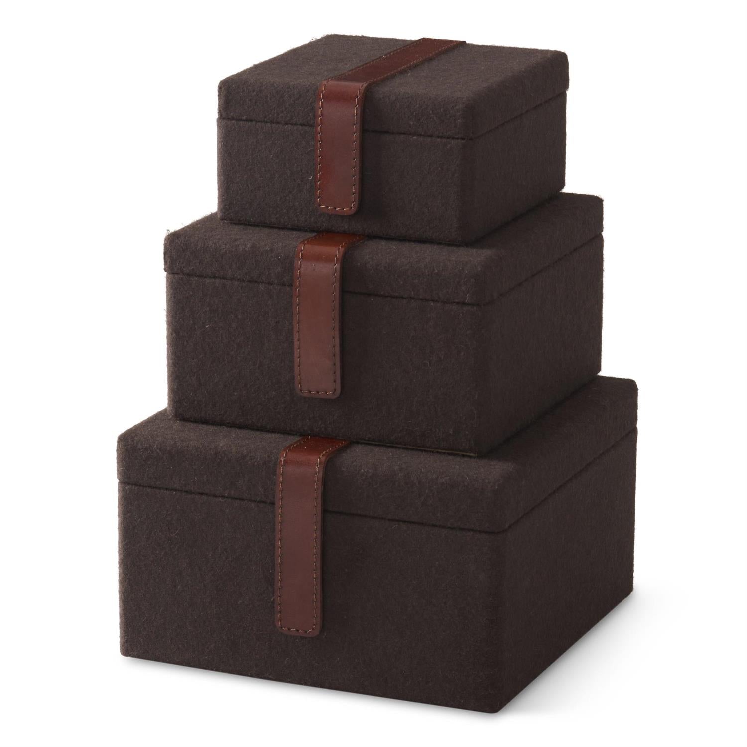 Brown felt gift boxes with ribbon bows arranged in a stack, perfect for packaging presents